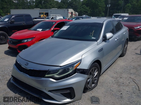 2020 Kia Optima LX with VIN 5XXGT4L3XLG429961, listed as a IAAI auction lot 42483950 with 97,677 mi miles and . Bid and sale history available at DreamBid. Image 2.