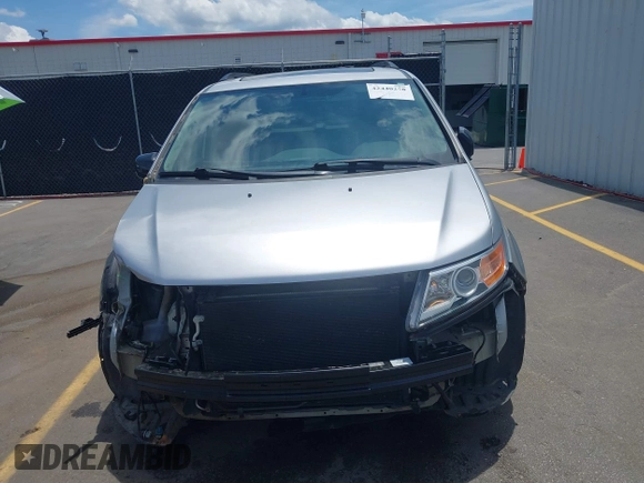2012 Honda Odyssey EX-L with VIN 5FNRL5H65CB076534, listed as a IAAI auction lot 42440258 with 150,866 mi miles and . Bid and sale history available at DreamBid. Image 13.