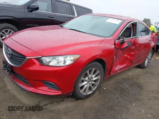 2016 Mazda 6 i Sport with VIN JM1GJ1U54G1457194, listed as a IAAI auction lot 41725704 with 109,628 mi miles and . Bid and sale history available at DreamBid. Image 2.