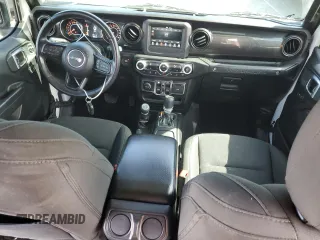 2019 Jeep Wrangler Unlimited Sport Altitude with VIN 1C4HJXDG2KW675235, listed as a Copart auction lot 54389785 with 88,825 mi miles and Salvage title. Bid and sale history available at DreamBid. Image 8.