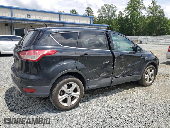 2014 Ford Escape SE with VIN 1FMCU9GX4EUE31879, listed as a Copart auction lot 61907565 with 42,107 mi miles and Salvage title. Bid and sale history available at DreamBid. Image 5.