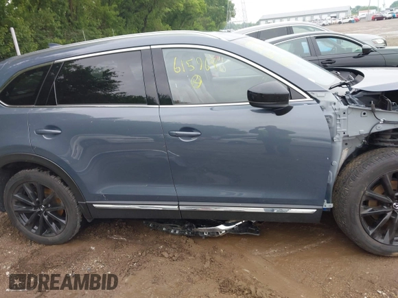 2022 Mazda CX-9 Grand Touring with VIN JM3TCBDY0N0615968, listed as a IAAI auction lot 42312159 with 22,912 mi miles and . Bid and sale history available at DreamBid. Image 13.