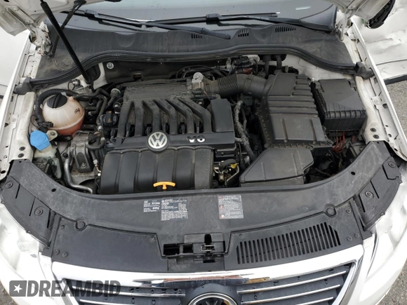 2008 Volkswagen Passat z VIN WVWCU73C58P028217, wystawiony jako Copart lot #52451275 z przebiegiem 70 829 mil mil oraz Szkoda całkowita • Salvage title. Historia ofert i sprzedaży dostępna na DreamBid. Obrazek 12.