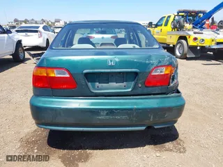 1999 Honda Civic VP with VIN 2HGEJ6611XH540017, listed as a IAAI auction lot 42093222 with 154,261 mi miles. Bid and sale history available at carsss.com. Image 16.