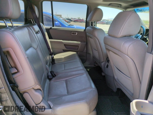 2012 Honda Pilot EX-L z VIN 5FNYF4H51CB061095, wystawiony jako Copart lot #57149985 z przebiegiem 170 486 mil mil oraz Szkoda całkowita • Salvage title. Historia ofert i sprzedaży dostępna na DreamBid. Obrazek 11.