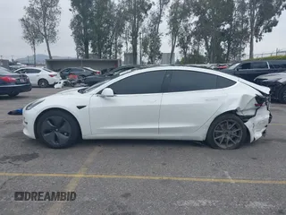 2020 Tesla Model 3 Long Range with VIN 5YJ3E1EB0LF803217, listed as a IAAI auction lot 41871940 with 130,391 mi miles. Bid and sale history available at carsss.com. Image 14.