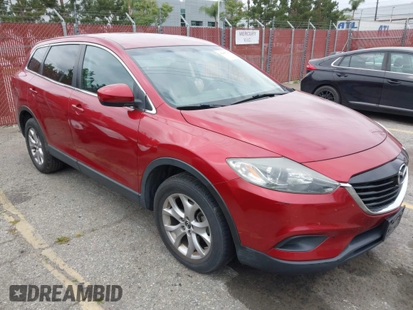 2015 Mazda CX-9 Touring with VIN JM3TB2CV5F0458675, listed as a IAAI auction lot 42047786 with 120,890 mi miles and . Bid and sale history available at carsss.com. Image 1.