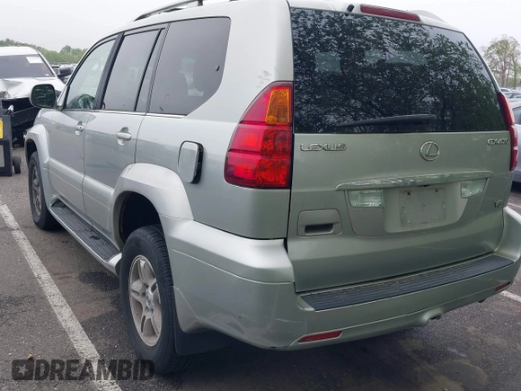 2004 Lexus GX 470 with VIN JTJBT20XX40032417, listed as a IAAI auction lot 42150885 with 180,568 mi miles. Bid and sale history available at carsss.com. Image 3.
