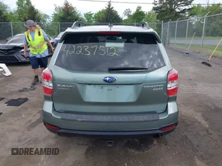 2015 Subaru Forester Touring with VIN JF2SJAWC9FH561581, listed as a IAAI auction lot 42237512 with 109,210 mi miles and . Bid and sale history available at DreamBid. Image 16.