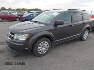 2018 Dodge Journey SE with VIN 3C4PDCABXJT170150, listed as a IAAI auction lot 40715756 with 113,330 mi miles and . Bid and sale history available at DreamBid. Image 2.