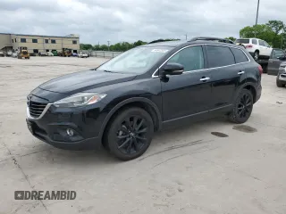 2015 Mazda CX-9 Grand Touring z VIN JM3TB2DA5F0467064, wystawiony jako Copart lot #54842855 z przebiegiem 107 141 mil mil oraz Czysty tytuł • Clean title. Historia ofert i sprzedaży dostępna na DreamBid. Obrazek 1.