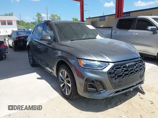2024 Audi Q5 S line Premium z VIN WA1GAAFY5R2109175, wystawiony jako IAAI lot #41938991 z przebiegiem 7133 mil mil oraz . Historia ofert i sprzedaży dostępna na DreamBid. Obrazek 1.