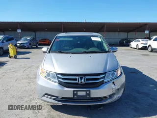 2014 Honda Odyssey EX-L with VIN 5FNRL5H63EB041106, listed as a IAAI auction lot 42294113 with 122,610 mi miles and . Bid and sale history available at DreamBid. Image 13.