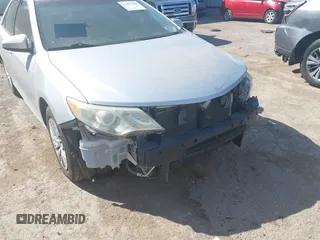 2014 Toyota Camry L with VIN 4T4BF1FK0ER421918, listed as a IAAI auction lot 42027646 with 152,088 mi miles and . Bid and sale history available at DreamBid. Image 6.