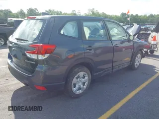 2022 Subaru Forester with VIN JF2SKAAC3NH503999, listed as a IAAI auction lot 42373622 with 18,430 mi miles and . Bid and sale history available at DreamBid. Image 4.