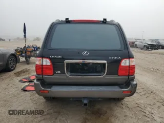 2001 Lexus LX 470 z VIN JTJHT00W513509447, wystawiony jako Copart lot #43988595 z przebiegiem 251 861 mil mil oraz Tytuł czysty. Historia ofert i sprzedaży dostępna na DreamBid. Obrazek 6.
