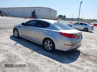2014 Kia Optima LX with VIN KNAGM4A79E5470198, listed as a IAAI auction lot 42142484 with 169,140 mi miles. Bid and sale history available at carsss.com. Image 3.
