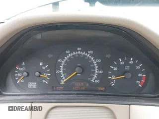 1998 Mercedes-Benz E-Class with VIN WDBJF65FXWA589630, listed as a IAAI auction lot 41990725 with 102,149 mi miles. Bid and sale history available at carsss.com. Image 7.