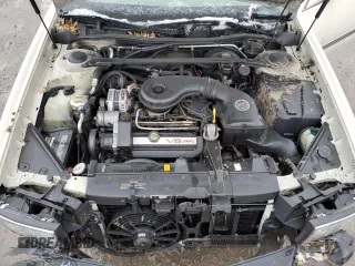 1995 Cadillac DeVille z VIN 1G6KD52B8SU274053, wystawiony jako Copart lot #86429934 z przebiegiem 100 496 mil mil oraz Szkoda całkowita • Salvage title. Historia ofert i sprzedaży dostępna na DreamBid. Obrazek 12.