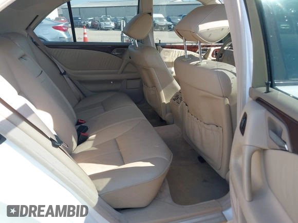 1999 Mercedes-Benz E-Class with VIN WDBJF65H6XA867166, listed as a IAAI auction lot 42017341 with 89,841 mi miles. Bid and sale history available at carsss.com. Image 8.
