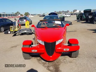 1999 Plymouth Prowler z VIN 1P3EW65G4XV503282, wystawiony jako IAAI lot #41282258 z przebiegiem 58 866 mil mil oraz . Historia ofert i sprzedaży dostępna na DreamBid. Obrazek 12.