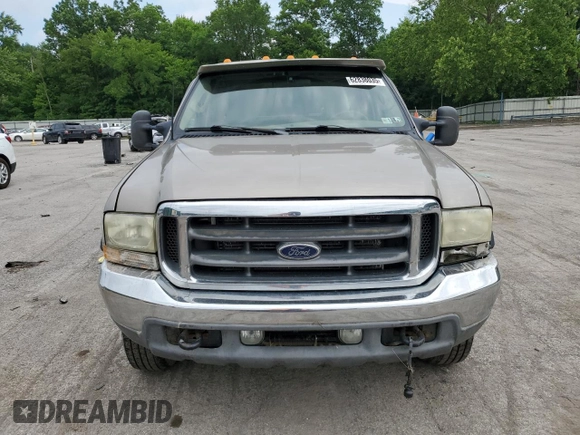 2003 Ford F-350 XL with VIN 1FTSW31F13EA50456, listed as a Copart auction lot 62838035 with 214,969 mi miles and Salvage title. Bid and sale history available at DreamBid. Image 5.