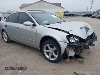 2005 Nissan Altima SE with VIN 1N4BL11E65C133566, listed as a IAAI auction lot 41792300 with 169,733 mi miles. Bid and sale history available at carsss.com. Image 1.