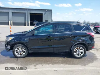2018 Ford Escape SE z VIN 1FMCU9GD1JUD48846, wystawiony jako IAAI lot #42112952 z przebiegiem 117 580 mil mil oraz . Historia ofert i sprzedaży dostępna na DreamBid. Obrazek 14.