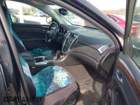 2012 Cadillac SRX Luxury Collection with VIN 3GYFNAE37CS651847, listed as a IAAI auction lot 41929524 with 144,961 mi miles and . Bid and sale history available at carsss.com. Image 5.