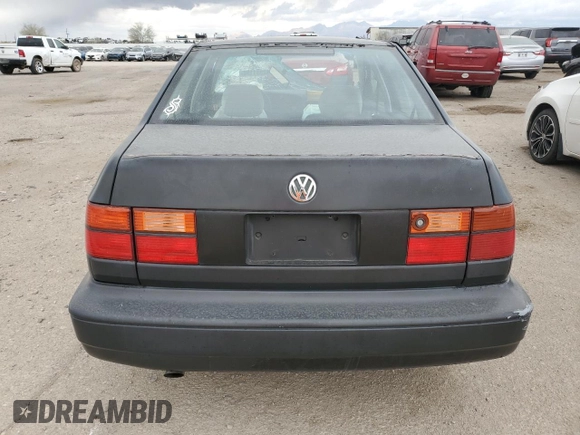 1996 Volkswagen Jetta с VIN 3VWRA81H5TM069238, выставлен на аукционе Copart как лот 42831195 с пробегом 226 935 миль миль и Списание • Salvage title. История ставок и продаж доступна на DreamBid. Изображение 6.