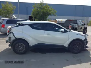 2018 Toyota C-HR XLE z VIN NMTKHMBX4JR049041, wystawiony jako IAAI lot #42038397 z przebiegiem 74 930 mil mil oraz . Historia ofert i sprzedaży dostępna na DreamBid. Obrazek 14.