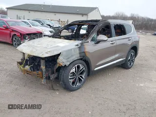 2019 Hyundai Santa Fe Ultimate with VIN 5NMS5CAA6KH035552, listed as a IAAI auction lot 41540230 with Not Provided miles and . Bid and sale history available at DreamBid. Image 2.