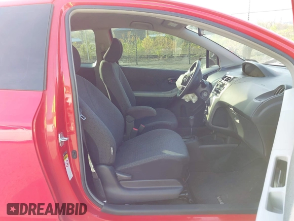 2009 Toyota Yaris with VIN JTDJT903495234216, listed as a IAAI auction lot 42123494 with 79,638 mi miles. Bid and sale history available at carsss.com. Image 5.