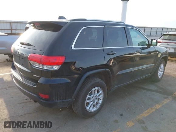 2018 Jeep Grand Cherokee Altitude with VIN 1C4RJFAG0JC305842, listed as a IAAI auction lot 41949021 with 83,773 mi miles and . Bid and sale history available at DreamBid. Image 4.