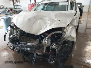 2016 Nissan Rogue SL with VIN 5N1AT2MV0GC770880, listed as a IAAI auction lot 41398955 with Not Provided miles and . Bid and sale history available at DreamBid. Image 6.