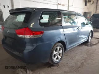 2014 Toyota Sienna L with VIN 5TDZK3DCXES434910, listed as a IAAI auction lot 41731864 with 146,161 mi miles. Bid and sale history available at carsss.com. Image 4.