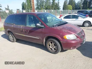 2001 Dodge Grand Caravan z VIN 2B4GP54371R346238, wystawiony jako IAAI lot #42227070 z przebiegiem 299 056 mil mil oraz . Historia ofert i sprzedaży dostępna na DreamBid. Obrazek 1.