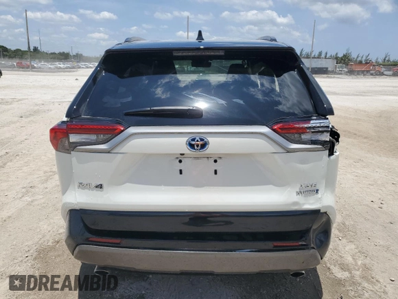 2021 Toyota RAV4 Hybrid XSE with VIN 4T3E6RFV3MU061808, listed as a Copart auction lot 57048025 with 20,614 mi miles and Salvage title. Bid and sale history available at DreamBid. Image 6.