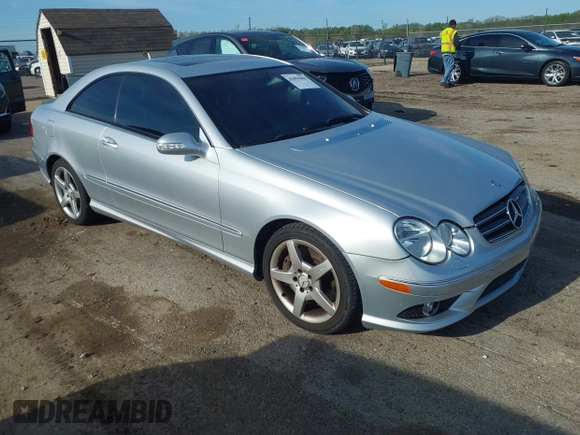 2007 Mercedes-Benz CLK-Class 5.5L with VIN WDBTJ72H97F209555, listed as a IAAI auction lot 42081006 with 137,436 mi miles. Bid and sale history available at carsss.com. Image 1.
