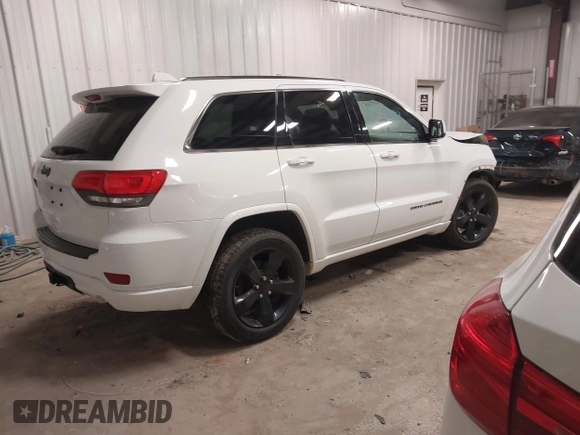 2015 Jeep Grand Cherokee Laredo with VIN 1C4RJFAG6FC606431, listed as a IAAI auction lot 41754182 with 99,987 mi miles. Bid and sale history available at carsss.com. Image 4.
