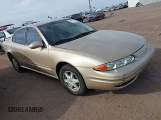 2002 Oldsmobile Alero GL1 with VIN 1G3NL52E52C132580, listed as a IAAI auction lot 41933636 with 164,863 mi miles and . Bid and sale history available at DreamBid. Image 1.