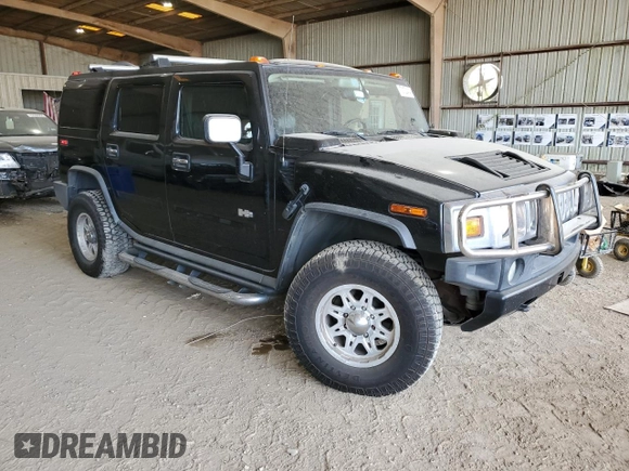 2005 Hummer H2 SUV with VIN 5GRGN23U95H117402, listed as a Copart auction lot 73132414 with 211,219 mi miles and Clean Title. Bid and sale history available at carsss.com. Image 4.