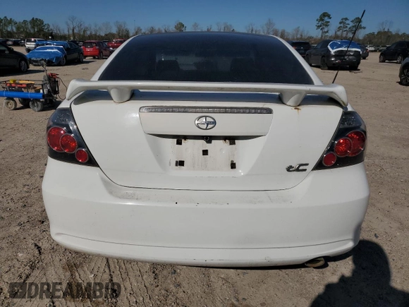 2009 Scion tC with VIN JTKDE167990297899, listed as a Copart auction lot 48591365 with 122,056 mi miles and Salvage Title. Bid and sale history available at carsss.com. Image 6.