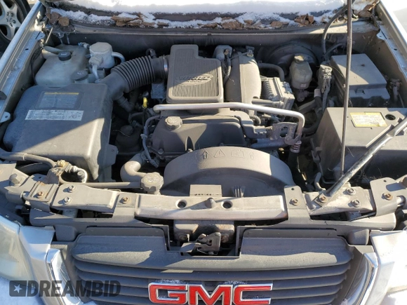 2005 GMC Envoy SLE with VIN 1GKDT13S952144044, listed as a Copart auction lot 88269485 with 0 mi miles and Salvage Title. Bid and sale history available at carsss.com. Image 12.