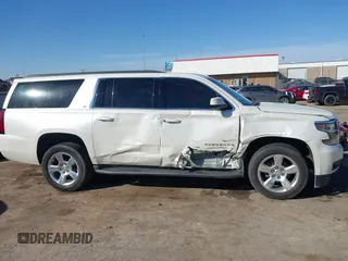 2015 Chevrolet Suburban LT with VIN 1GNSKJKC9FR717038, listed as a IAAI auction lot 41815942 with 123,095 mi miles and . Bid and sale history available at DreamBid. Image 13.