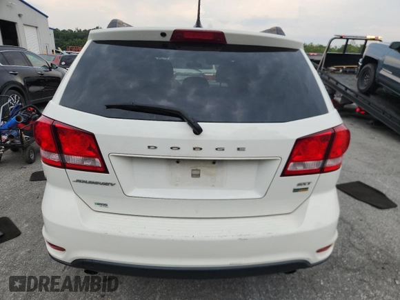 2017 Dodge Journey SXT z VIN 3C4PDCBG9HT571161, wystawiony jako Copart lot #64129155 z przebiegiem 260 314 mil mil oraz Czysty tytuł • Clean title. Historia ofert i sprzedaży dostępna na DreamBid. Obrazek 6.