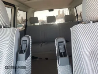 1999 Volkswagen EuroVan GLS с VIN WV2KH2705XH017697, выставлен на аукционе Copart как лот 69303664 с пробегом 156 811 миль миль и Списание • Salvage title. История ставок и продаж доступна на DreamBid. Изображение 10.