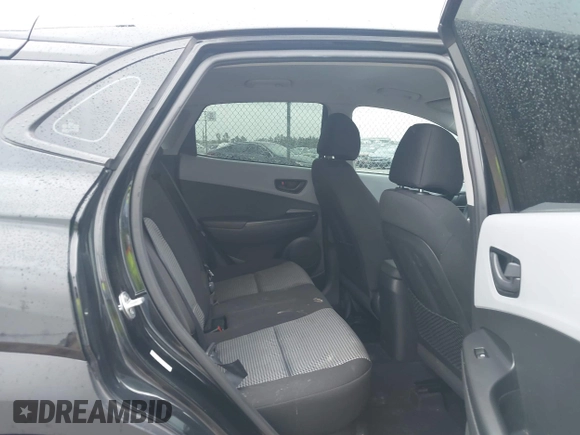 2018 Hyundai Kona SE with VIN KM8K12AA7JU128279, listed as a IAAI auction lot 41456296 with 100,977 mi miles and . Bid and sale history available at DreamBid. Image 8.