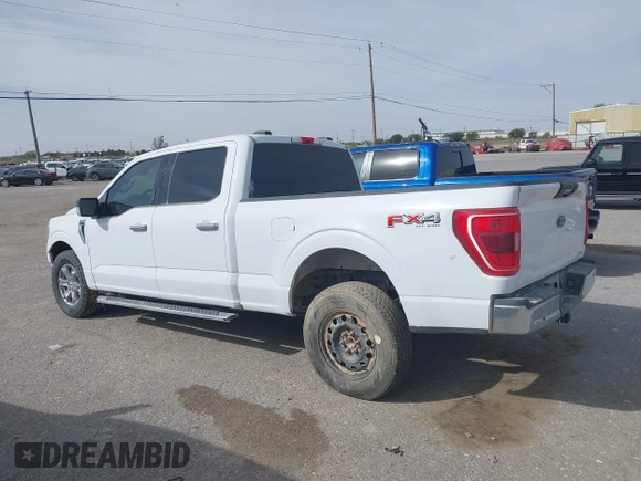 2023 Ford F-150 XL with VIN 1FTFW1E88PKD46695, listed as a IAAI auction lot 41936726 with 156,654 mi miles. Bid and sale history available at carsss.com. Image 14.