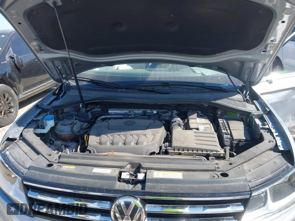 2021 Volkswagen Tiguan SE with VIN 3VV3B7AX0MM026064, listed as a IAAI auction lot 42038137 with 18,526 mi miles and . Bid and sale history available at DreamBid. Image 10.
